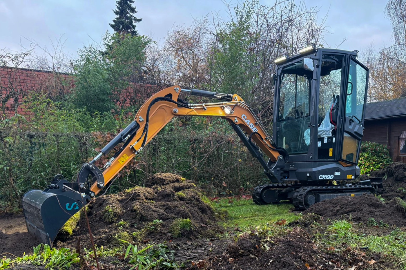 Case CX19D minigraver met Structon godet